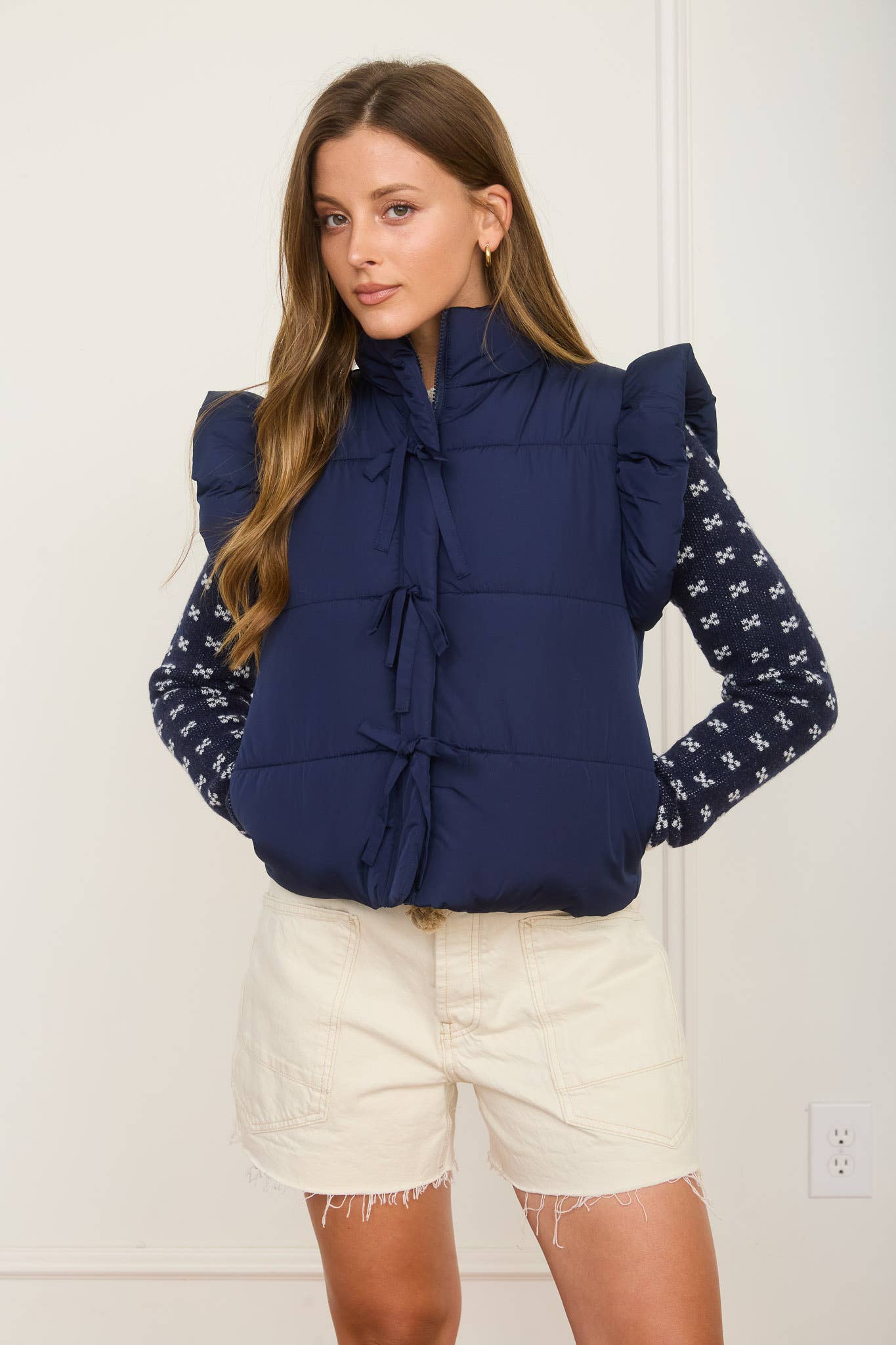FLUTTER SLEEVE BOW DETAIL ZIP-UP PUFFER VEST