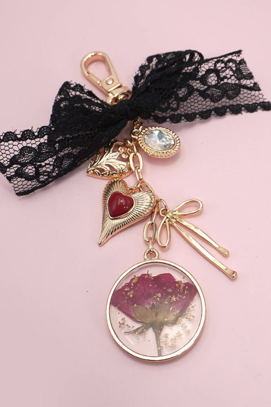 BAG CHARM-DRIED FLOWER BOW HEART RHINESTONE | 80K037